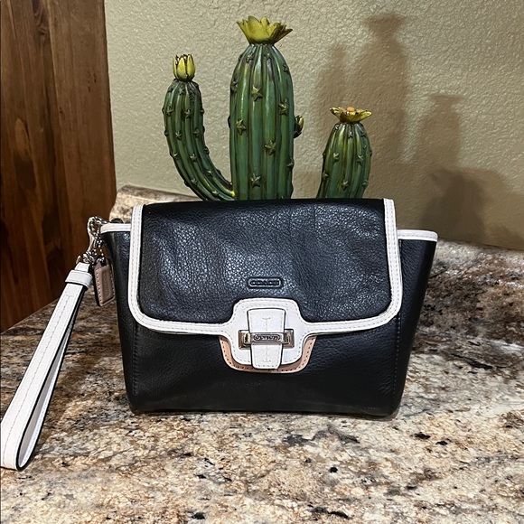 Coach Handbags - Coach EUC Black Leather Wristlet with White Trim and Tan Accent